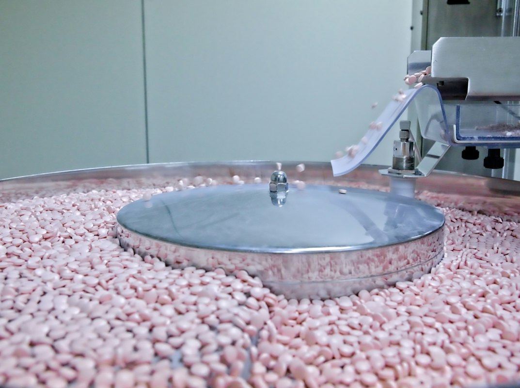 Pharmaceutical production line inside a manufacturing facility